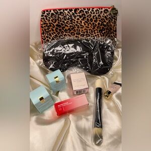 Estée Lauder skincare and fragrance with make up bag